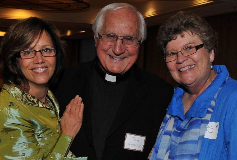 Bishop Thomas Gumbleton co-presides at prayer service for FutureChurch's leadership transition in 2013. The group's co-founder and outgoing executive director, Sr. Christine Schenk, is at right; the new director, Deb Rose-Milavec is at left. 