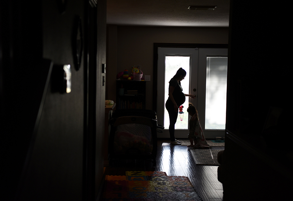 A pregnant woman in May in San Antonio (CNS/Reuters/Callaghan O'Hare)