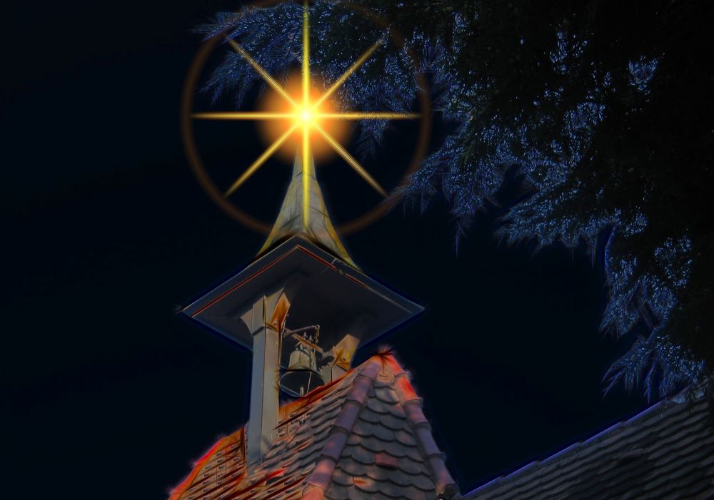 Church tower with Christmas star above