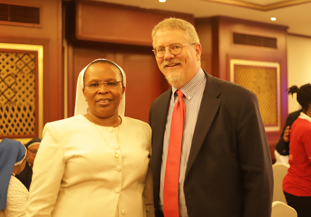 Sr. Jane Wakahiu, associate vice president of program operations and the head of Catholic Sisters Initiative at Conrad N. Hilton Foundation, poses for a photo with Peter Laugharn, the foundation's current president and chief executive officer. The Conrad N. Hilton Foundation, which funds GSR, is among the Women Deliver 2023 Conference participants in Kigali, Rwanda. (GSR photo/Doreen Ajiambo)
