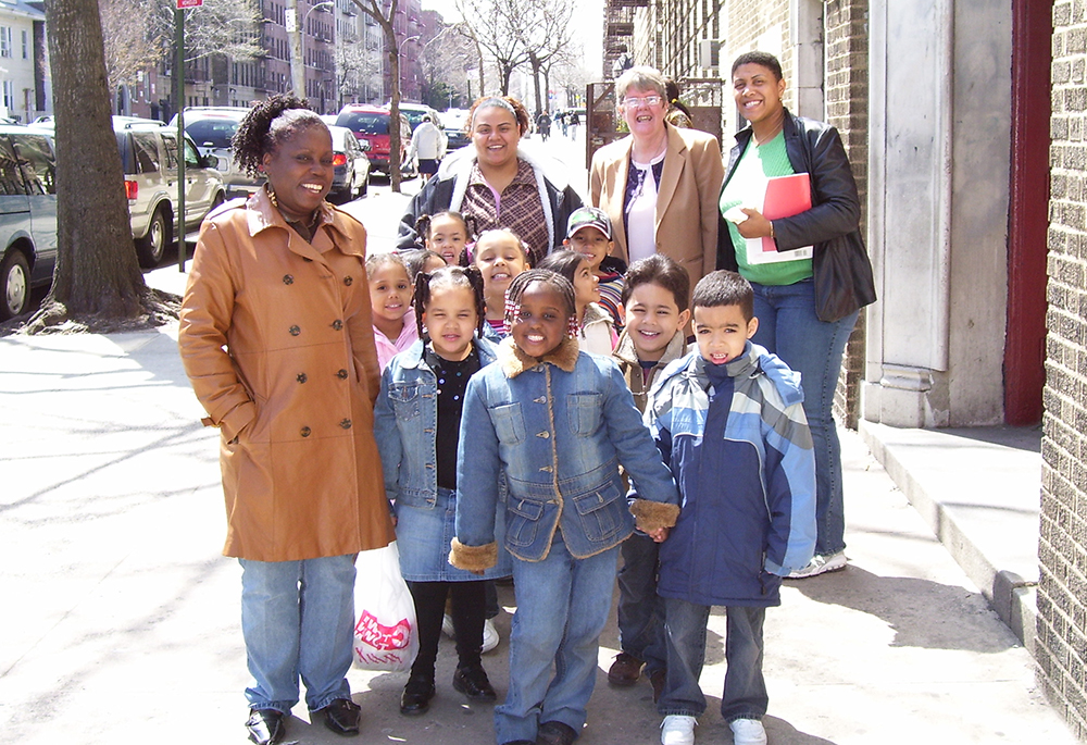 Sr. Maggie McDermott of the Sisters of St. Dominic of Blauvelt, New York recently retired from a 43-year-ministry at the Tolentine Zeiser Community Life Center in the Bronx. Here she is pictured (second from right, back row) with Miss Willie’s pre-K class at Tolentine Universal Pre-K in the 1990s. (Courtesy of the Sisters of St. Dominic of Blauvelt, New York)
