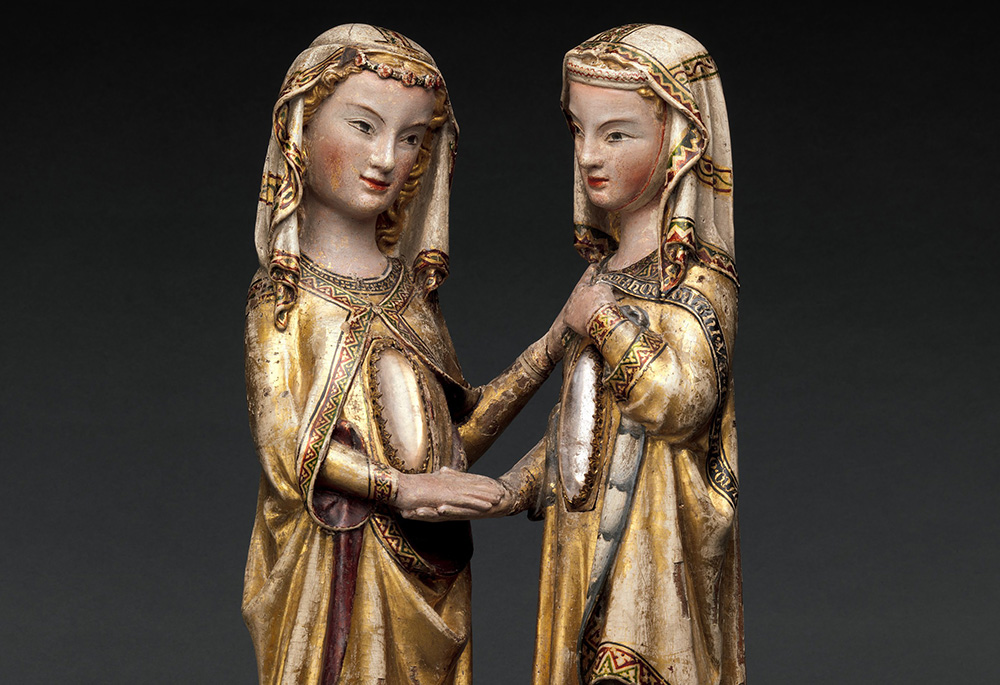 "The Visitation," a sculpture attributed to Master Heinrich of Constance, circa 1310-20; MetMuseum.org states that "the figures of Mary and Elizabeth are each inset with crystal-covered cavities through which images of their infants may originally have been seen." (Metropolitan Museum of Art)