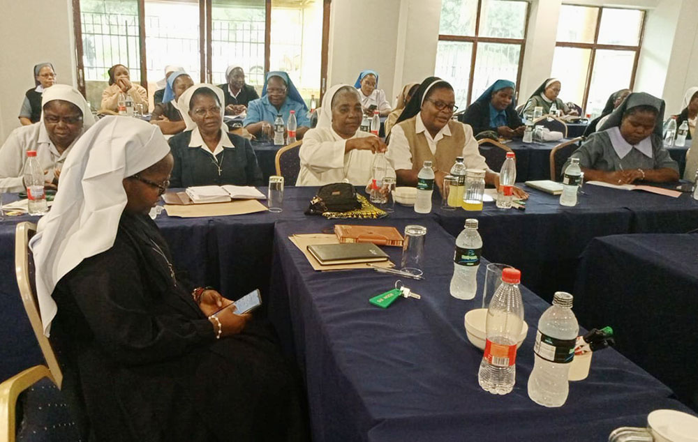 Religious sisters gather in Lilongwe, Malawi, to attend an advocacy training that aimed to equip the sisters with skills to better engage the government in addressing the needs of people affected by Cyclone Freddy, which hit the nation in March 2023. (Eneless Chimbali)