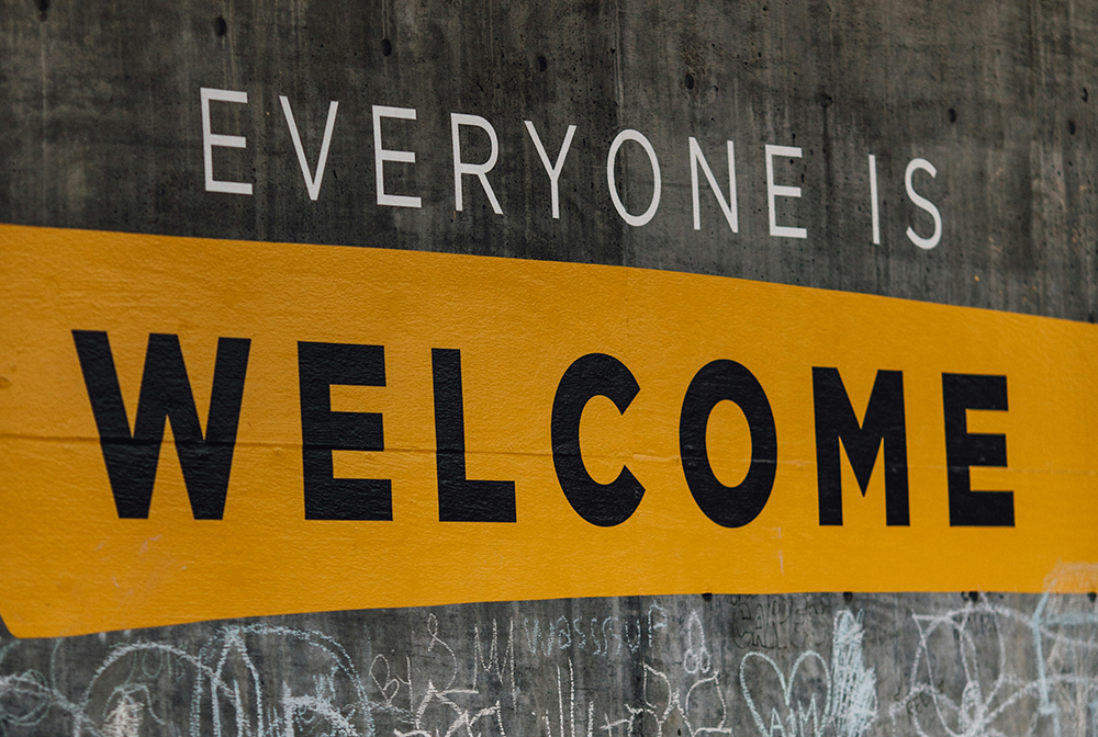 Everyone is welcome sign (Unsplash/Katie Moum)