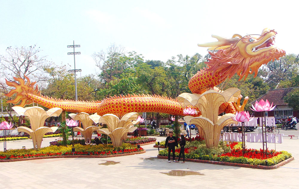 A dragon stands in a park in Hue, Vietnam, to welcome the Lunar New Year. (Joachim Pham)