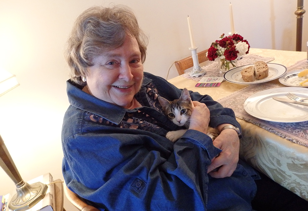 Elizabeth Johnson’s view of creation as a circle of kinship, rather than a hierarchy of being, means that yes, your dog or cat will go to heaven. She is pictured here with her cat Orion, named because "she is a constellation of beauty," Johnson says. (Courtesy of Elizabeth Johnson)