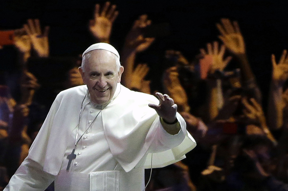 Pope Francis waves to the crowd during a parade Sept. 26, 2015, in Philadelphia. (AP/Matt Rourke, Pool, File)