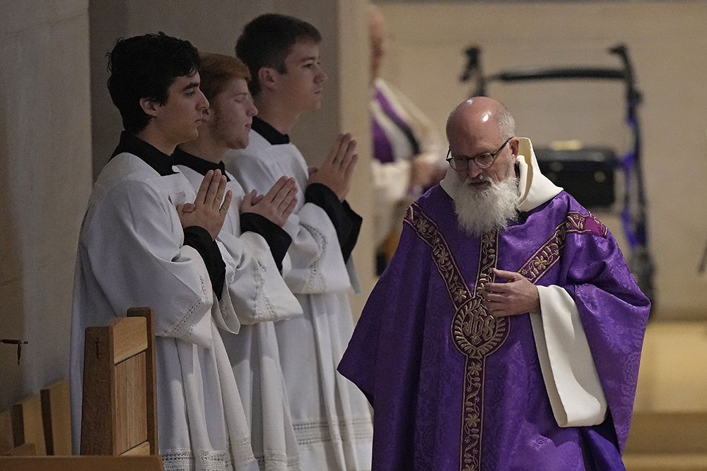 Fr. Gabriel Landis officiates a Catholic Mass at Benedictine College Dec. 3, 2023, in Atchison, Kansas. (AP/Charlie Riedel)