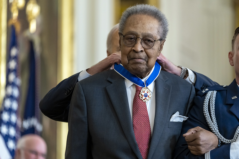 Clarence B. Jones, a former speechwriter and attorney for Dr. Martin Luther King Jr., receives the Presidential Medal of Freedom from Joe Biden at the White House on May 3 in Washington. (The White House/X)
