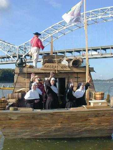In August 2004, members of the Ursuline Sisters of Mount St. Joseph embark on a 150-mile river trip retracing a route along the Ohio River taken by missionary nuns in 1874. (CNS/The Record/Marnie McAllister)