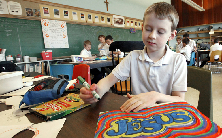 A third-grade student works on a project in 2012 at St. Linus School in Oak Lawn, Ill., a suburb of Chicago. (CNS/Catholic News World/Karen Callaway)