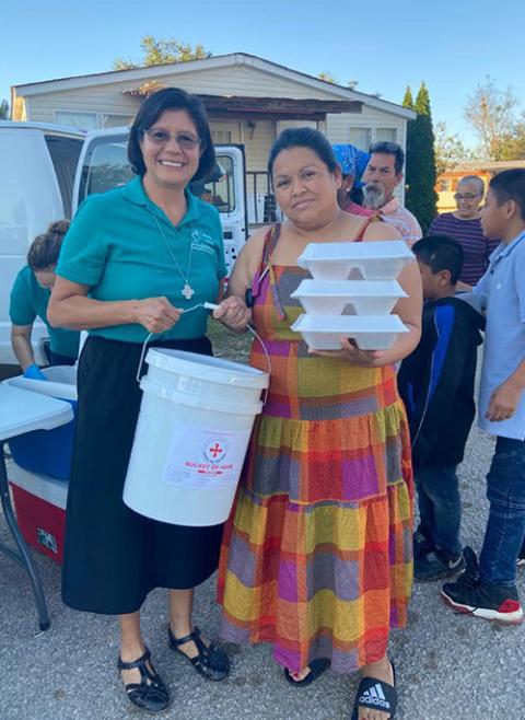 Sr. Gabriela Ramírez of the Guadalupan Missionaries of the Holy Spirit provides relief to victims of October 2021 flooding in Pelham, Alabama. (Courtesy of Gabriela Ramírez)