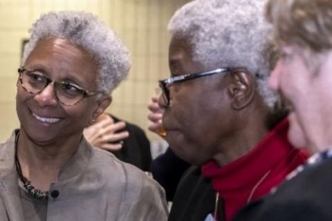 M. Shawn Copeland, left, speaks to guests during an April 26, 2019, conference Boston College held to honor her career and scholarly accomplishments. The theologian will speak at the upcoming LCWR conference.