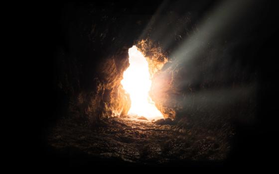 Light shining into a dark cave (Unsplash/Bruno Van Der Kraan)