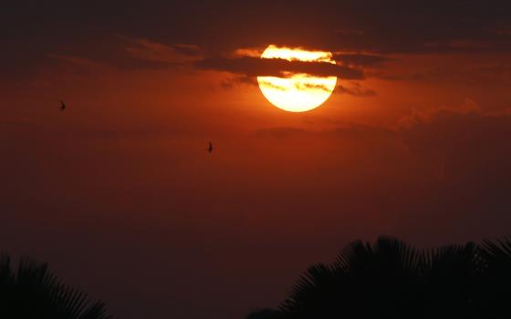 The sun rises Feb. 5 in Juba, South Sudan. (CNS/Paul Haring)