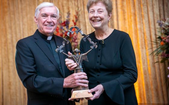 Father Jack Wall, president of Catholic Extension, poses with Dominican Sister Jane Meyer Feb. 15, 2024, after he presented her with Extension's seventh annual Houston Spirit of Francis Award for her decades of commitment to Catholic education and promotion of social justice.