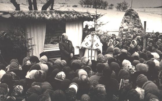 A liturgy of the Ukrainian Greek Catholic Church, held outside in the village Tserkivna, Ivano-Frankivsk region, Ukraine, 1989 (Courtesy of Basilian Sisters' museum, Osijek, Croatia)