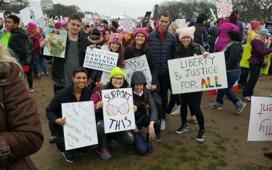 The Women's March, held in a number of cities around the U.S. in January 2017, kicked off a new wave of protests that have spanned President Donald Trump's first term. Katie Killpack, is pictured third from right, standing at the march in Washington, D.C.