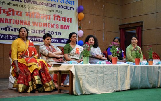 Holy Spirit Sr. Lizy Thomas (third from left) shares the stage with other women at an International Women's Day celebration in Bhopal, central India. (Saji Thomas)