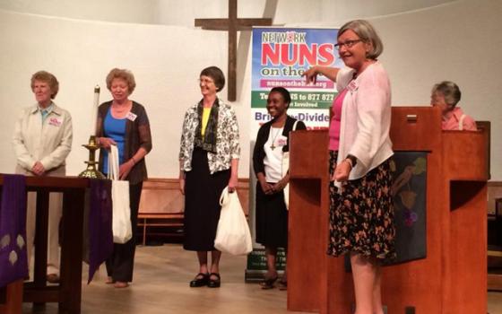 Social Service Sr. Simone Campbell, second from right, introduces the sisters riding on the first leg of the Nuns on the Bus 2015. (GSR/Tom Fox)