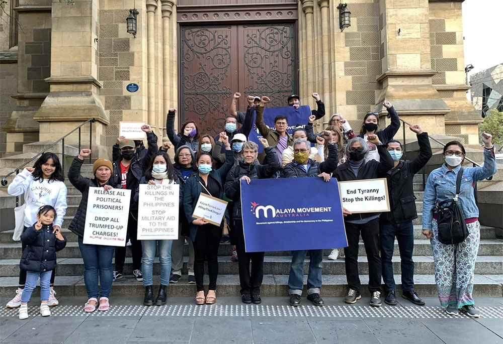 Sr. Patricia Fox joins members of the Philippines Caucus for Peace outside the Anglican St. Paul's Cathedral in Melbourne, Australia, marking International Human Rights Day on Dec. 10, 2021. (Courtesy of Patricia Fox)