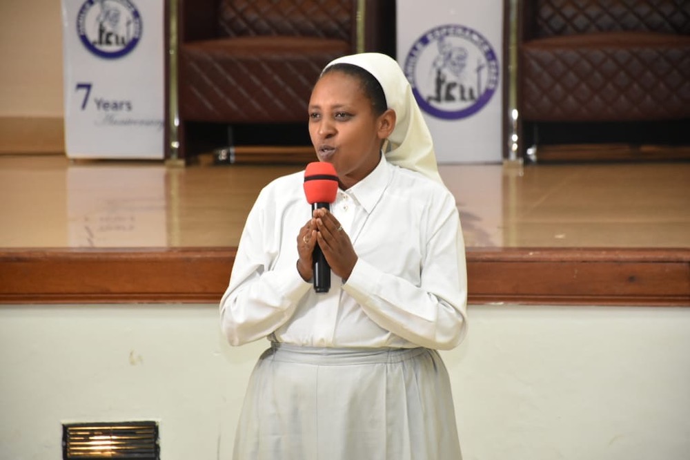 Sr. Immaculate Uwamariya of the Bernardine Sisters addresses members of Famille Espérance during the December 2019 celebration of the seventh anniversary of the organization. (Aimable Twahirwa)