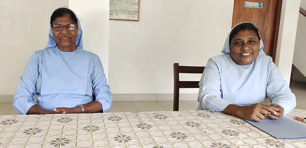 Sr. Shiroma Kurumbalapitiya, right, the Sri Lankan provincial of the Salvatorian Sisters, and her predecessor, Sr. Dulcie Fernando, at their provincial house in Kurunegala, Sri Lanka. (Thomas Scaria)