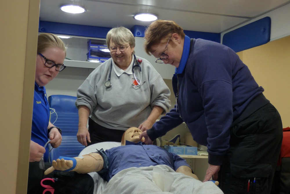 Paramedic students Destiny Hatfield, left, and Lyn Garison, right, work through a simulated emergency medical scenario as teacher Sr. Kathy Limber looks on at Southwest Virginia Community College in Cedar Bluff. (Provided photo) Paramedic students Destiny Hatfield, left, and Lyn Garison, right, work through a simulated emergency medical scenario as teacher Sr. Kathy Limber looks on at Southwest Virginia Community College in Cedar Bluff. (Provided photo)