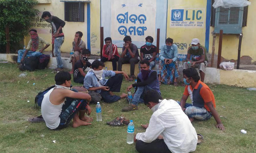 Migrants from Maharashtra traveled by truck and were left May 25 at Bondamunda, Odisha, in India. They sat in the sun without food for an entire day. The author and her congregation, the Missionary Sisters Servants of the Holy Spirit, gave them food and m Migrants from Maharashtra traveled by truck and were left May 25 at Bondamunda, Odisha, in India. They sat in the sun without food for an entire day. The author and her congregation, the Missionary Sisters Servants of the Holy Spirit, gave them food and m