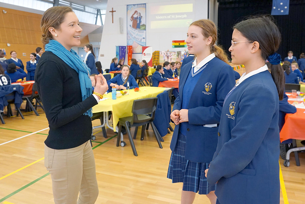 Sr. Jane Maisey with students of Mount St. Joseph High School in Milperra, Sydney, Australia in 2019. To Maisey, the following year, 2020, was the year of reverberantly rhetorical "Are you serious?!" moments. (Provided photo) Sr. Jane Maisey with students of Mount St. Joseph High School in Milperra, Sydney, Australia in 2019. To Maisey, the following year, 2020, was the year of reverberantly rhetorical "Are you serious?!" moments. (Provided photo)