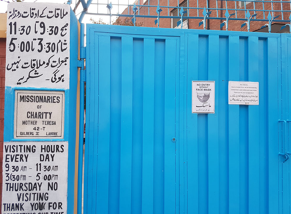 A coronavirus precaution notice at Home of Love, run by Missionaries of Charity nuns in Lahore, Pakistan. (Kamran Chaudhry)