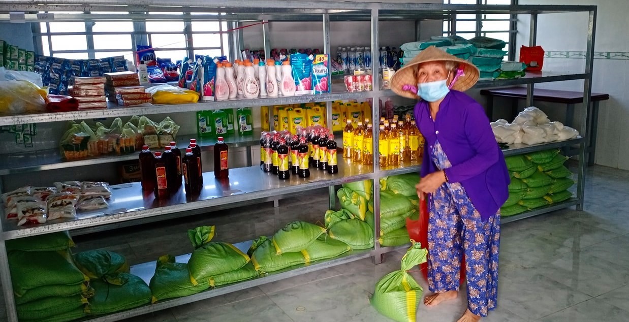 Father Joseph, the priest at Duong Lang parish, organizes a free supermarket that provides salt, sugar, soy sauce, instant noodles and rice for the people living in poverty. (Mary Nguyen Thi Phuong Lan)