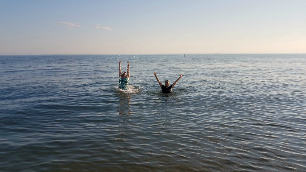 Srs. Ana Gonzalez, left, and AnHoa Nguyen enjoy the water of the Long Island Sound at Hammonasset Beach State Park in Madison, Connecticut, this past summer. (Provided photo)