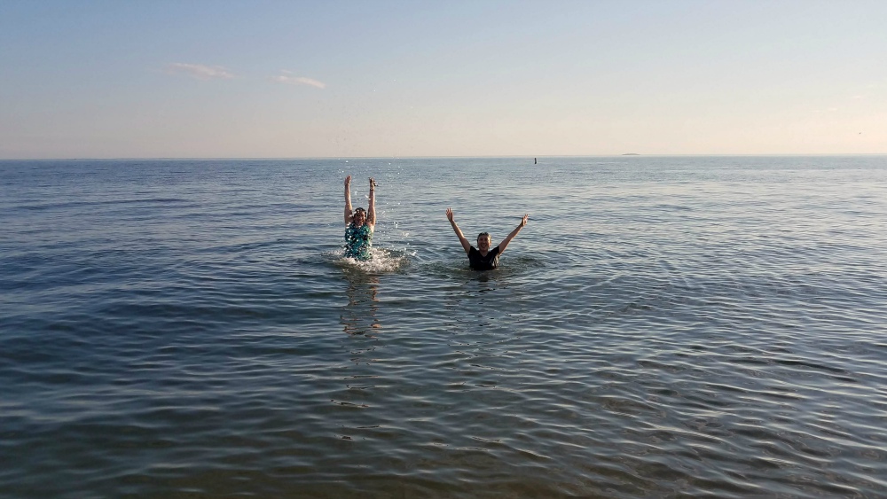 Srs. Ana Gonzalez, left, and AnHoa Nguyen enjoy the water of the Long Island Sound at Hammonasset Beach State Park in Madison, Connecticut, this past summer. (Provided photo) Srs. Ana Gonzalez, left, and AnHoa Nguyen enjoy the water of the Long Island Sound at Hammonasset Beach State Park in Madison, Connecticut, this past summer. (Provided photo)