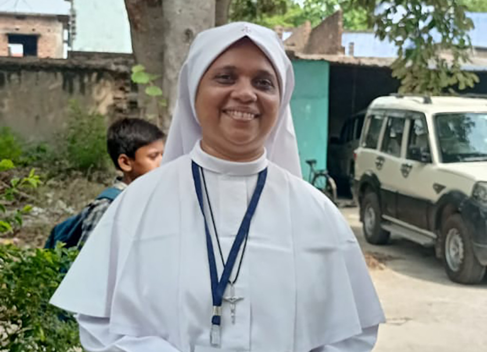Sr. Anisha Arackal, a member of the Sisters of the Destitute, takes a break during the Jesus Youth Conference in Patna, capital of the eastern Indian city of Bihar. (Courtesy of Anisha Arackal)