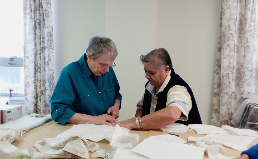 Presentation Srs. Judy Cunningham and Toni Martinez make masks for those in need. (Provided photo)