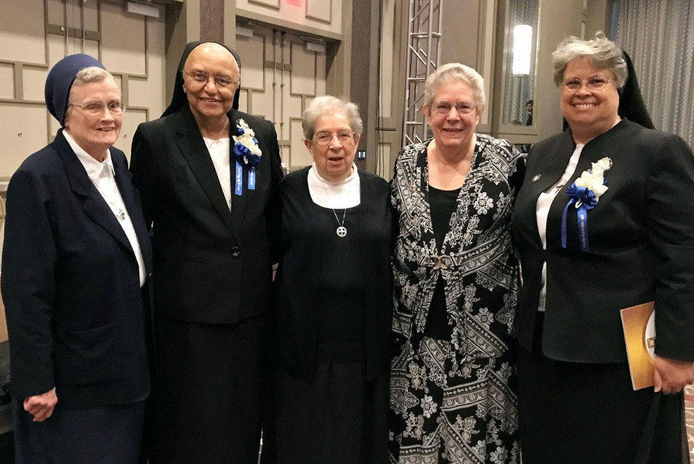 From left: Charity Sr. Miriam Richard Soisson, Holy Family Sr. Sylvia Thibodeaux, Charity Sr. Louise Grundish, Charity Sr. Vivien Linkhauer and Holy Family Sr. Alicia Costa celebrate the 175th anniversary of the founding of the Sisters of the Holy Family 