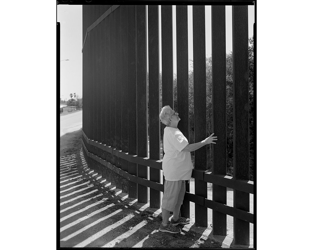 St. Joseph Sr. Sharon White at the border wall in Hidalgo. "She had more energy than I've ever seen in a person in my entire life," Elmaleh says of her fellow volunteer. "A radiant light." (© Lisa Elmaleh)