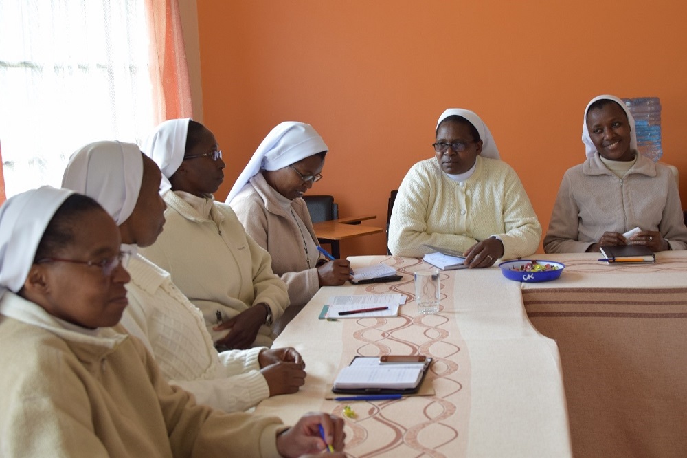 Missionary Sisters of the Holy Family talk about their experiences as part of their 2019 canonical visitation meeting in Nairobi, Kenya. (Courtesy of Lilian Atieno)