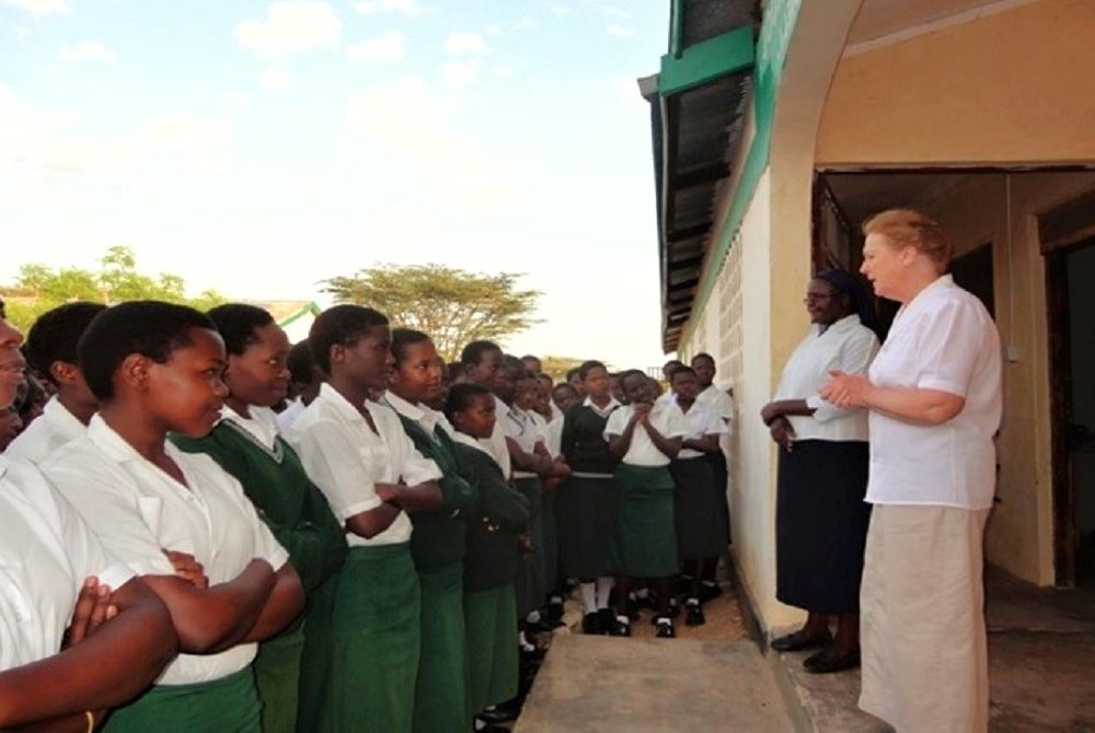 Sr. Mary McHugh, who spent most of her ministry in Kenya, addresses students in 2011 at Turkana Girls Secondary School, Lodwar. It was the first secondary school for girls in the Turkana Desert. Also pictured is Sr. Florence Nabwire, principal. 