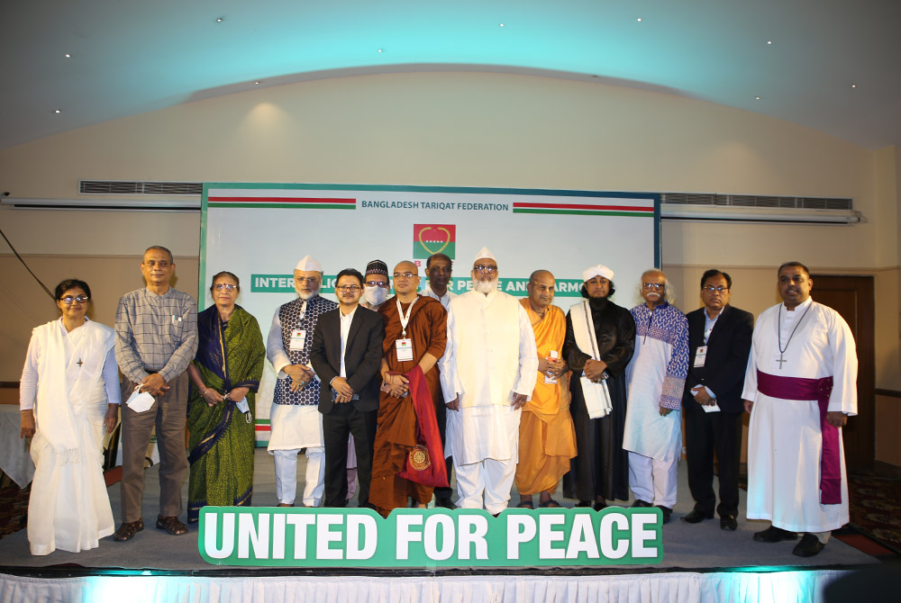 Sr. Reba Veronica D'Costa, far left, poses with other faith leader at the conclusion of an interfaith seminar. About 250 leaders of many faiths participated. (GSR photo/Sumon Corraya)