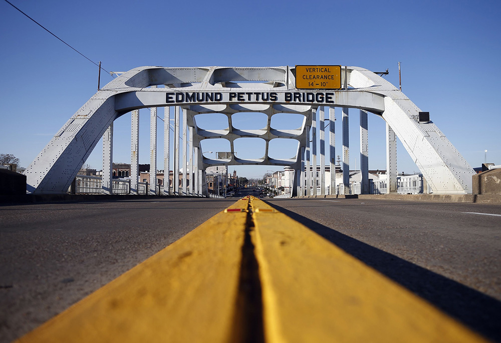 The Edmund Pettus Bridge is seen Jan. 8, 2015, in Selma, Alabama. The bridge was the scene of a major civil rights confrontation in March 1965, in which police beat protesters who were marching to demand voting rights for African Americans. (CNS) The Edmund Pettus Bridge is seen Jan. 8, 2015, in Selma, Alabama. The bridge was the scene of a major civil rights confrontation in March 1965, in which police beat protesters who were marching to demand voting rights for African Americans. (CNS)