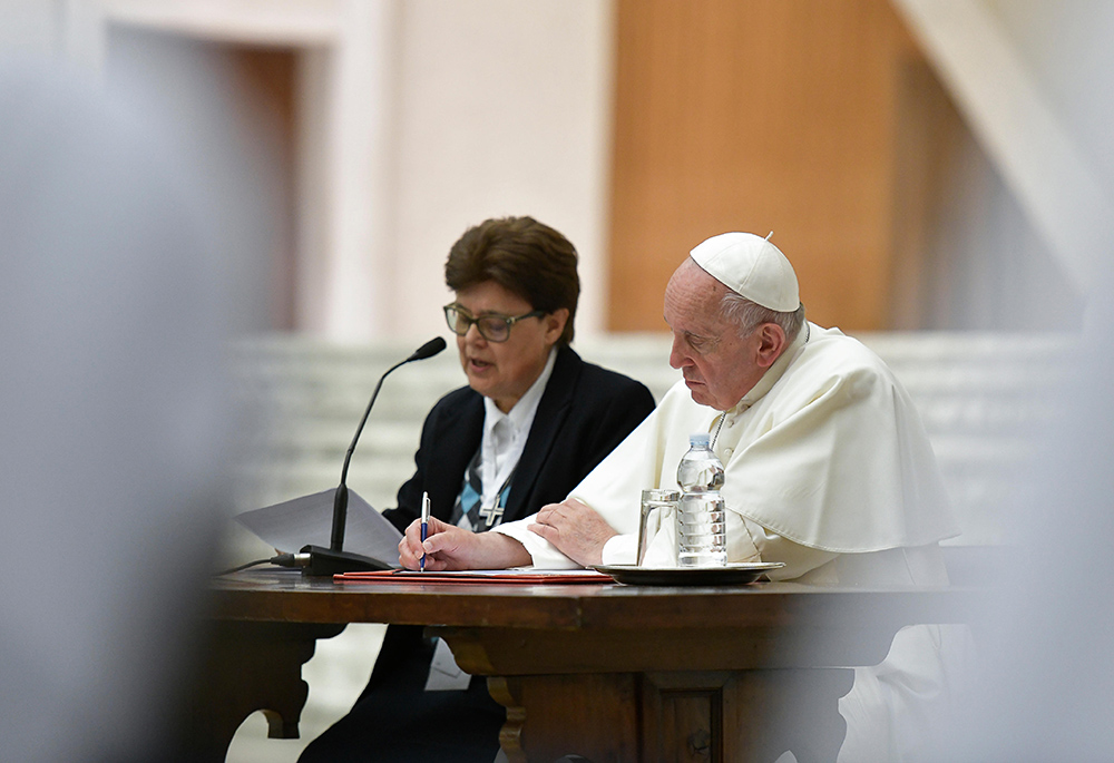 Sr. Carmen Sammut, superior general of the Missionary Sisters of Our Lady of Africa and the outgoing president of the International Union of Superiors General, gives her address alongside Pope Francis during a meeting May 10, 2019, at the Vatican (CNS)