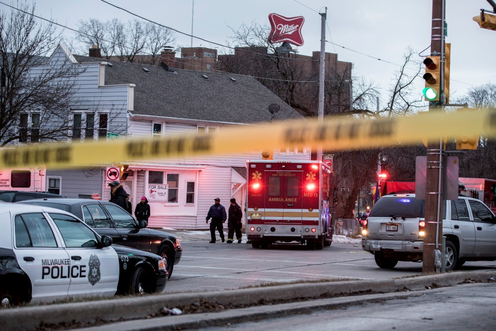 Police investigate a shooting at the Molson Coors headquarters in Milwaukee Feb. 26. (CNS/Reuters/Sara Stathas) 