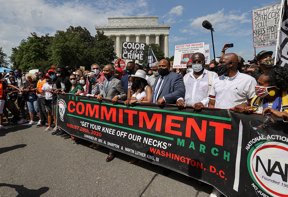 The Rev. Al Sharpton and Martin Luther King III, son of slain civil rights leader Rev. Martin Luther King Jr., his wife Arndrea Waters King and other leaders begin the "Get Your Knee Off Our Necks" Commitment March on Washington Aug. 28, 2020. (CNS)