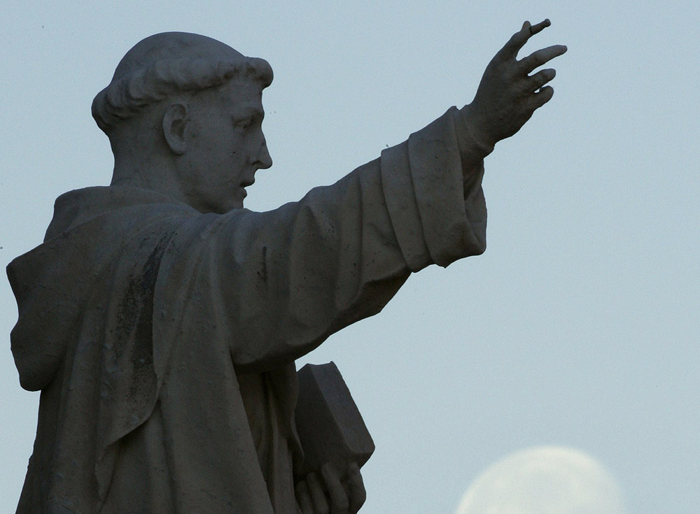 A statue of St. Dominic is seen outside the Dominican House of Studies in Washington. (CNS/Bob Roller)