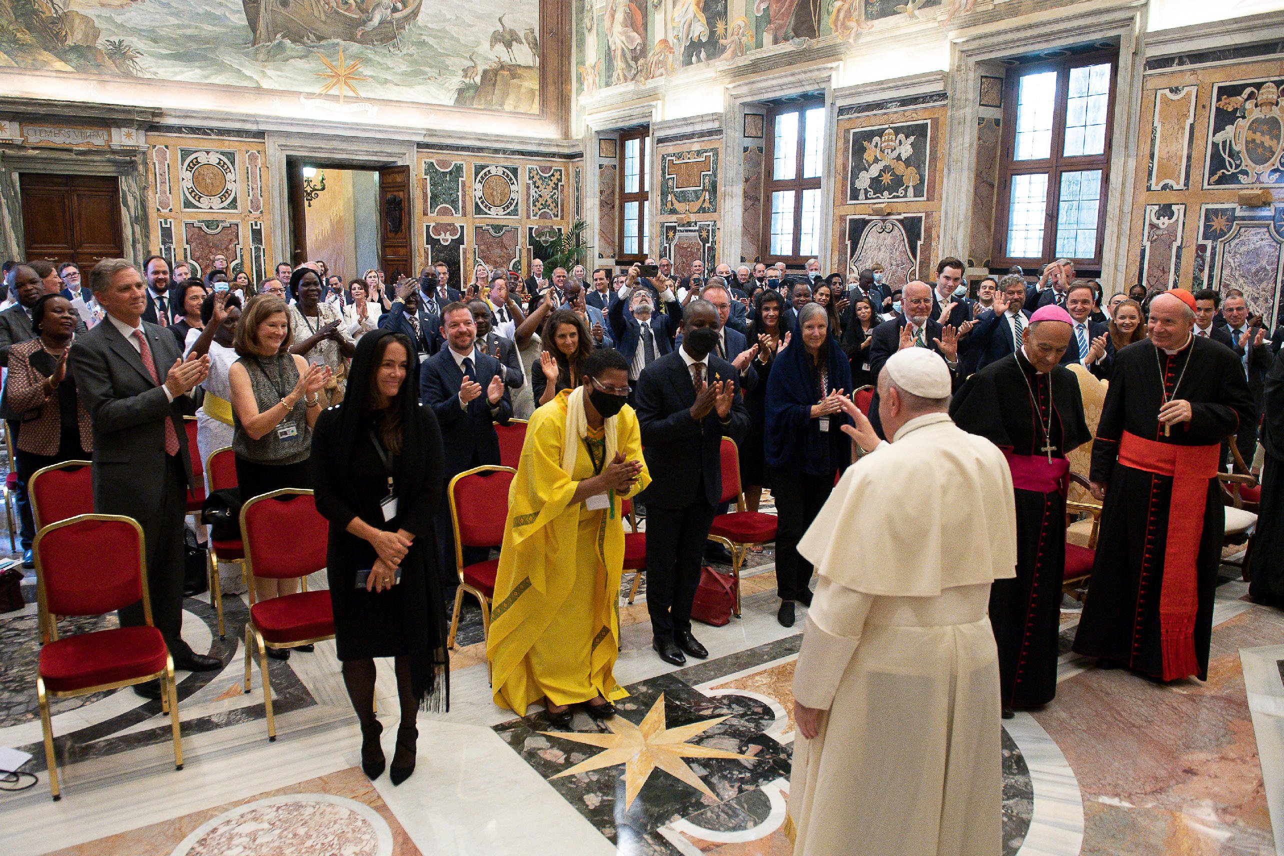 Pope Francis greets members of the International Catholic Legislators Network during an audience at the Vatican Aug. 27, 2021. The pope spoke to Catholic and Christian legislators about the need to regulate and develop sound policies regarding today's dig