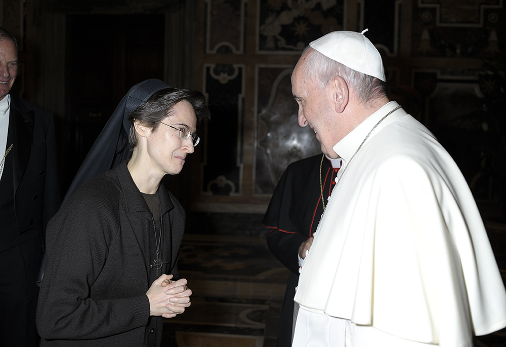 Pope Francis greets Sr. Raffaella Petrini, an Italian member of the U.S.-based Franciscan Sisters of the Eucharist, at the Vatican on Dec. 3, 2015. (CNS/Vatican Media)