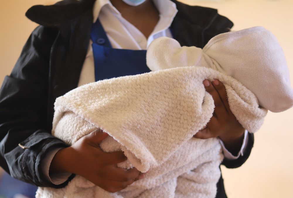 Woman holding baby