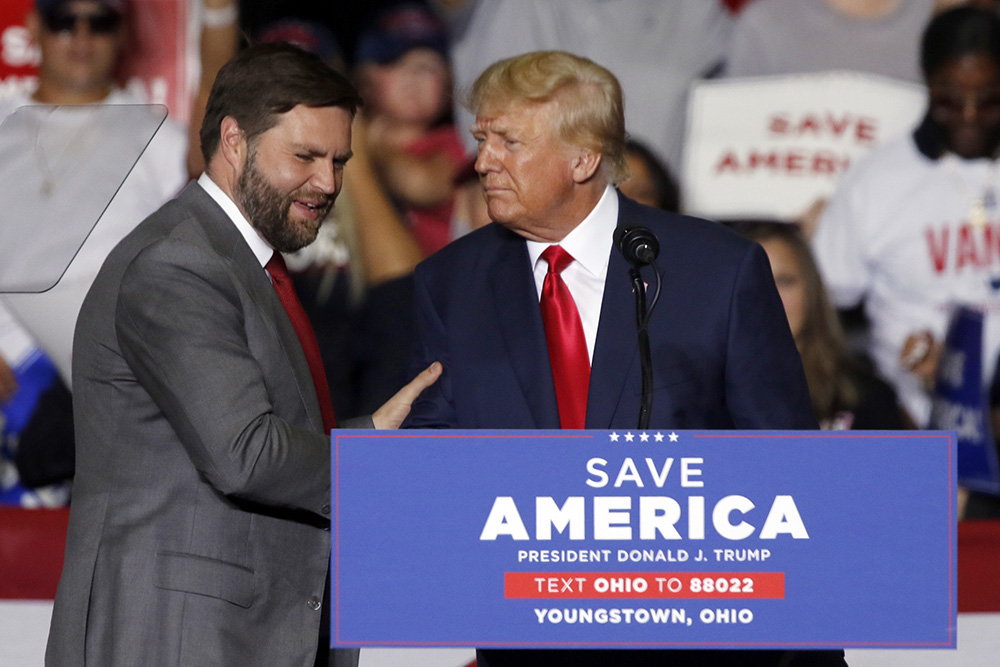 Former President Donald Trump welcomes J.D. Vance, Republican candidate for U.S. senator for Ohio, to the stage at a campaign rally in Youngstown, Ohio, Sept. 17. (AP/Tom E. Puskar)
